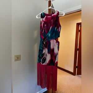 Cut out dress with fringe.  Worn once for a party.